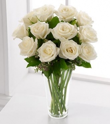 White Roses In A Glass Vase