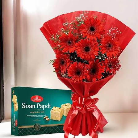 10 Red Gerberas Bouquet with Soan Papdi (500g)