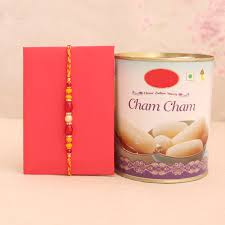 A fancy Rakhi paired with Cham Cham