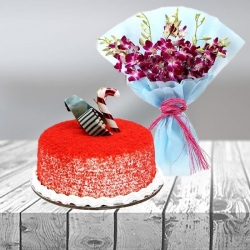 A lovely bouquet of orchids and a delicious red velvet cake