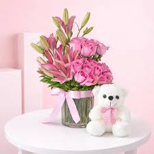 Astonishing Pink Flowers Vase arrangement with Cute Teddy Bear