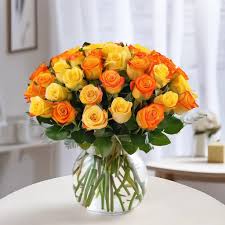 Astonishing Yellow with Orange Roses in a Vase