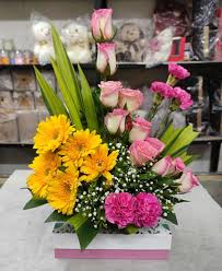Basket arrangement of Multicolored Flowers
