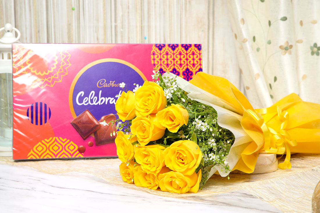 Blazing Yellow Roses Bouquet with Cadbury celebration box