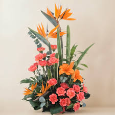Charming Basket arrangement with Pink & Orange Exotic flowers