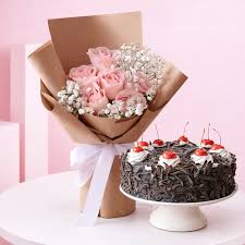 Delicious Black Forest Cake with a Bouquet of Pink Roses