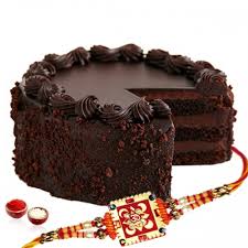Delicious chocolate cake with gorgeous Rakhi and Roli Chawl.