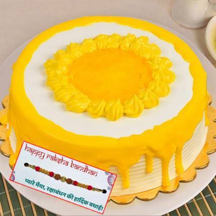 Delicious Mango cream cake with Fancy Rakhi