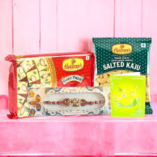 Delicious Sweets Paired with Fancy Rakhi & Salted Kaju