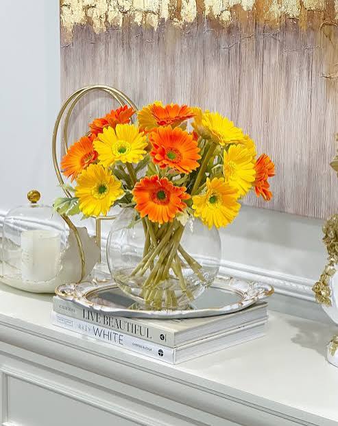 Delightful Orange and Yellow Gerberas arranged in Vase