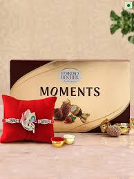 Designer Rakhi with the Ferrero Rocher Moments box.