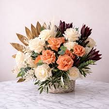 Elegant White and Peach Floral Arrangement