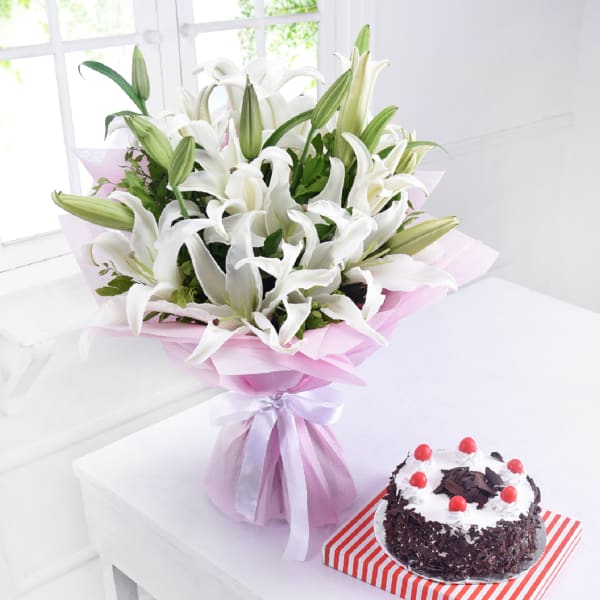Exceptional White Lilies Bouquet Combined with Black Forest Cake