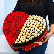 Exotic 50 Red Roses Paired with Ferrero Rocher in Heart shape Black box