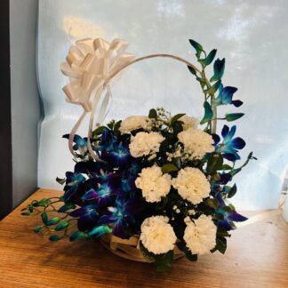 Exotic Blue Orchids paired White Carnations in a Basket