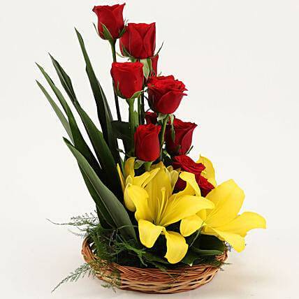 Exotic Yellow Lilies and Red Roses Basket Arrangement