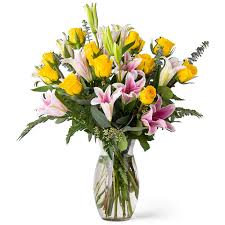 Exquisite Pink Lilies with Yellow Roses in a Vase