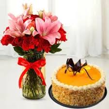Exquisite Red Carnations and Pink Lilies in vase with Fresh Fruit cake
