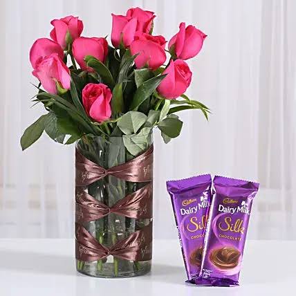 Fascinating Pink Floral Arrangement with Delectable Chocolates