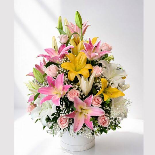 Glamours White Pink and Yellow Flowers arrangement