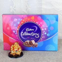 Gold ingot Buddha with luscious Cadbury Celebration box