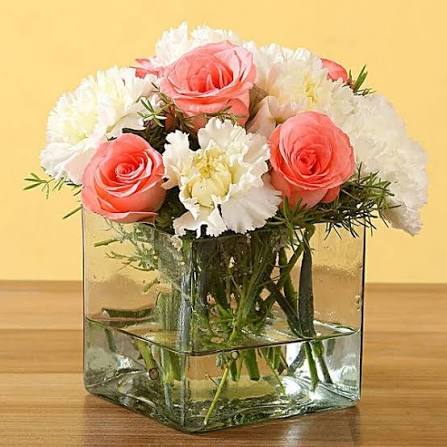 Gorgeous White Carnations paired with Pink Roses in a vase