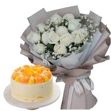 Graceful White Roses Bouquet with Toothsome Mango cake