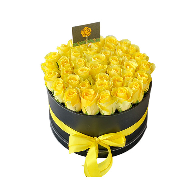 High-end Black fox arrangement with Yellow Roses
