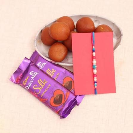 Lovely Rakhi with Luscious Gulab Jamun and Silk Chocolates combo