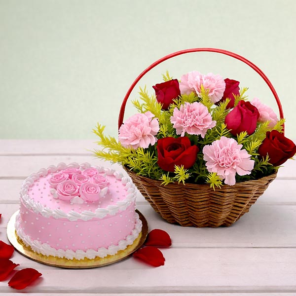 Lovely Red and Pink Flower Bouquet with Strawberry Cake.