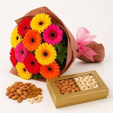 Mix bright gerberas with dry fruit.