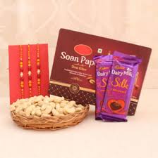 Nutritious Cashew paired with Fancy Rakhi, Yummy Chocolate and Soan Papdi