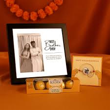 Personalised Tabletop Photo frame paired with Designer Rakhi and chocolate combo