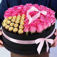Pink Roses fused with Ferrero Rocher in a black box.