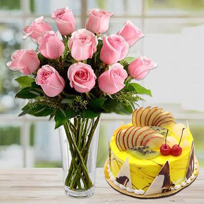 Pink Roses Vase Arrangement with 1 Kg Fresh Fruit Cake Combo