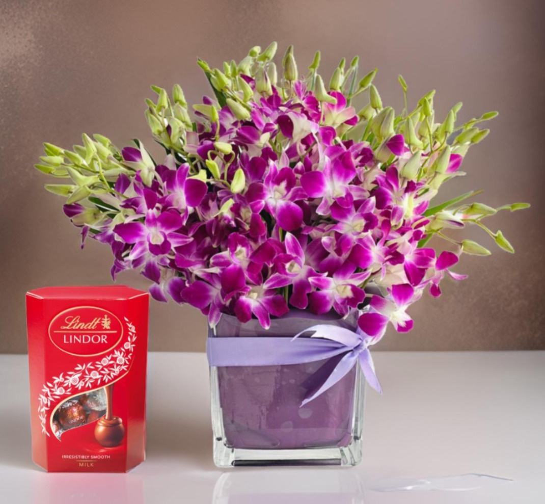 Premium Lindt Chocolate with Blue Orchids vase arrangement