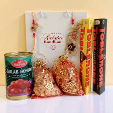 Premium Toblerone chocolate coupled with fancy Rakhi and assorted dry fruits.