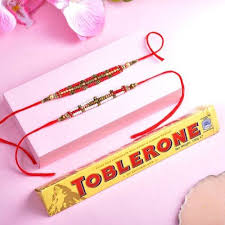 Premium Toblerone Chocolate paired with decorative Rakhi's