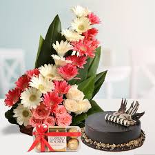 Pretty Pink and White Flowers in Basket coupled with Chocolate cake and Ferrero Rocher box.