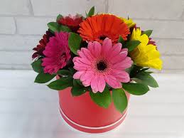 Red Box Arrangement with Multicolored Gerberas