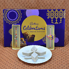 Sumptuous Kaju Katli paired with Designer Rakhi and Cadbury celebration box
