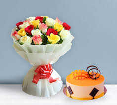 Sumptuous Mango cream Cake with Multicolor Roses Bouquet