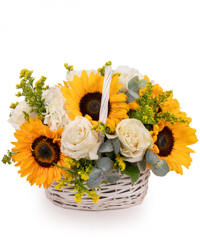 Sunflower basket bouquet paired with white roses