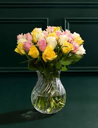 Unique Pink, White, and Yellow roses merged in a vase.