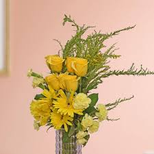 Yellow Roses, Yellow Carnations, Yellow Gerberas fused in a vase