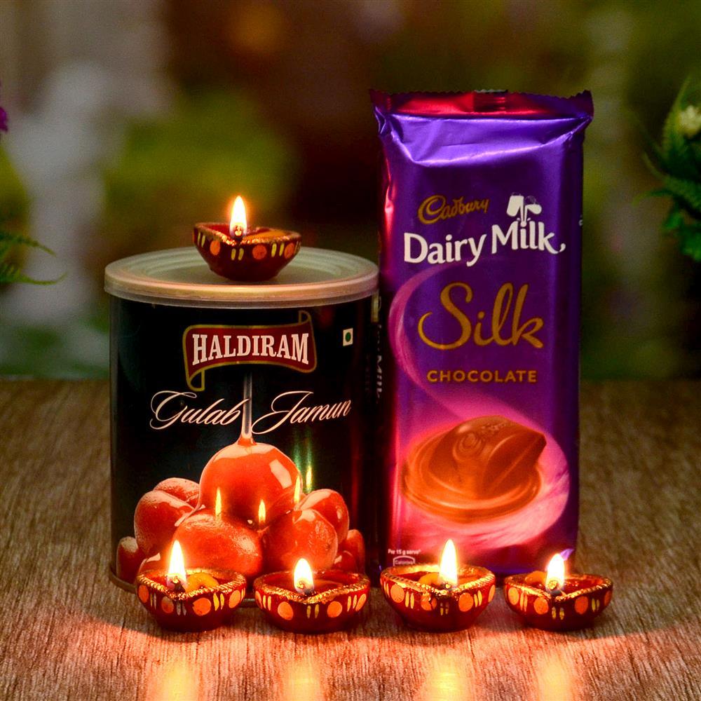 Yummy Gulab Juman with Dairy Milk Silk and Diyas combo